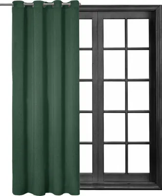 A dark green curtain hangs in front of a window with multiple panes.
