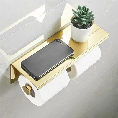 Imagen del producto de Soporte para papel higiénico Unyqoos® con espacio de almacenamiento y dispensador de pañuelos, montaje en pared, acero inoxidable 304, acabado dorado pulido, 27 x 10 x 9,5 cm