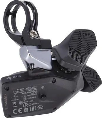 A close-up, studio shot of a bicycle gear shifter.