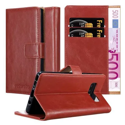 A red leather wallet-style phone case with credit cards and a banknote inserted, shown in a folded position.