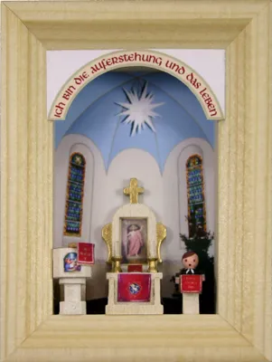 Imagen del producto de Marco en miniatura para decoración navideña, con una iglesia de pueblo. Dimensiones: 5,5 x 7 cm. Nuevo