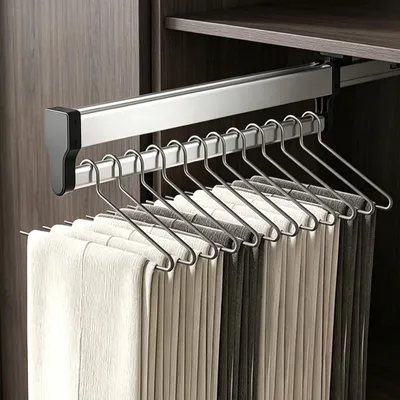 Image de Barre extensible pour cintres, idéale pour suspendre des pantalons