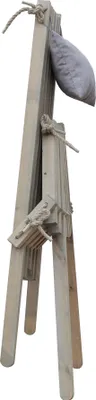 A wooden structure with a gray bag attached, isolated on a white background.