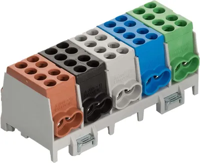 A row of electrical terminal blocks in different colors.