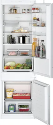 An open refrigerator with food items on the shelves.