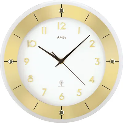 A close-up studio shot of a wall clock.