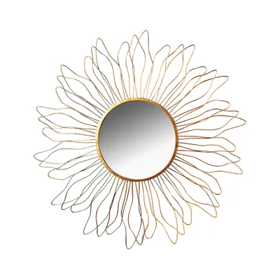 A decorative wall mirror with a sunburst-like frame.