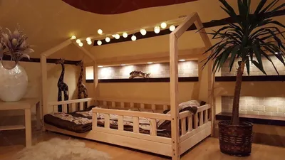Produktbild von HAUSBETT Kinderbett mit Rausfallschutz Naturholz BELLA 120x200 cm