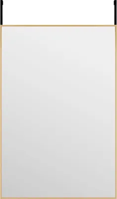 A rectangular mirror with a golden frame hanging from two black hooks at the top.
