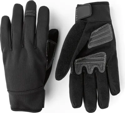 Schwarze Fingerhandschuhe "Tactility - 5 finger" von Hestra; mit verstärkten Handflächen und Klettverschluss.