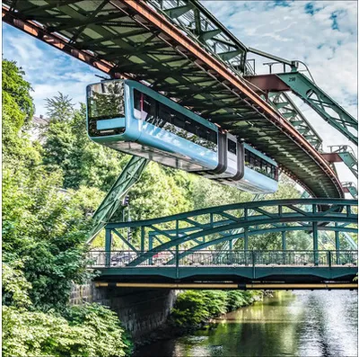Produktbild von Glasbild Wuppertal Schwebebahn Wupper 50x50 cm