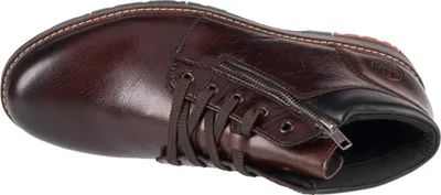 A top-down view of a brown leather boot.