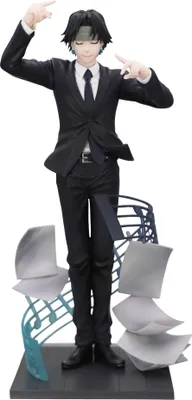 A figurine of a character from Hunter x Hunter in a suit, with musical notes and papers as a base.