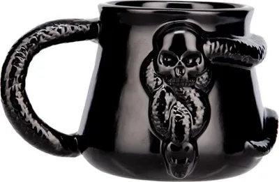 A black mug with a skull and snake design.