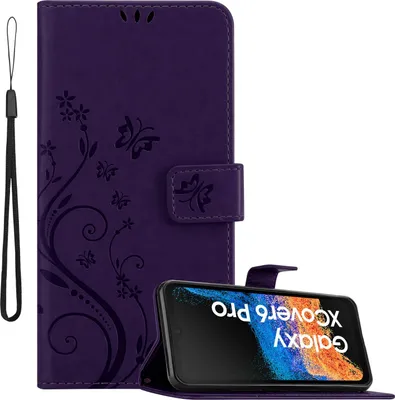 A purple flip case for a Samsung Xcover 6 Pro phone is shown, with the phone inside and displaying its screen. The case has a floral design and a wrist strap.