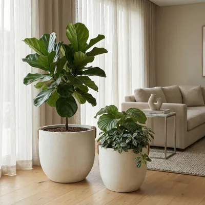 Produktbild von Rundes Blumentopf Set aus Keramik - Pflanzkübel für innen und außen - Handgefertigtes rustikales Design - Mit Drainagelöchern - 2er Set - Weiß