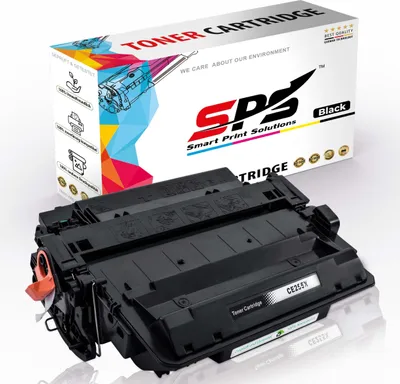 A black toner cartridge is shown in front of its packaging.