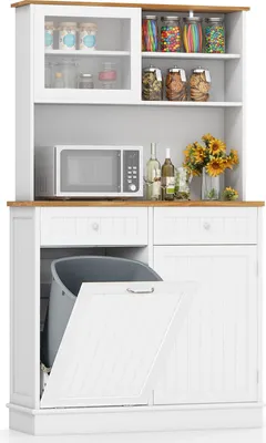 A white kitchen hutch with a wooden countertop, displaying various kitchen items and a microwave.