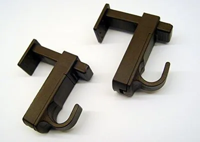 Two brown curtain rod brackets with hooks are shown on a white background.