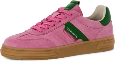 A single pink sneaker with green accents and a brown sole is shown against a white background.