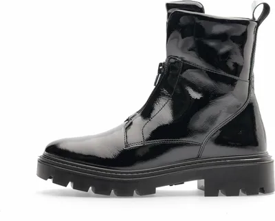 A black patent leather boot with a chunky sole and a zipper closure, shown from the side against a white background.