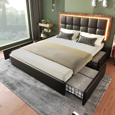 A bedroom setting with a bed and drawers pulled out.