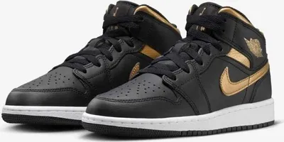 A pair of black and gold Nike Air Jordan 1 Mid sneakers.
