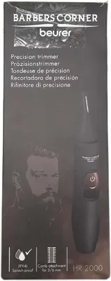 The image shows the packaging of a Beurer HR 2000 precision trimmer. The packaging features a graphic of a man's face with a beard, the product itself, and various text descriptions and icons.