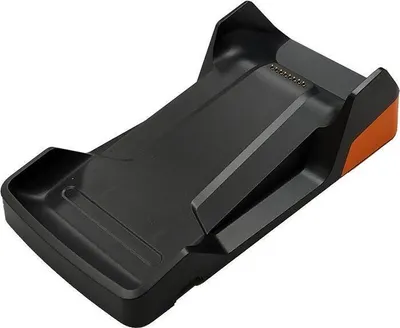 A black and orange charging dock for an electronic device.