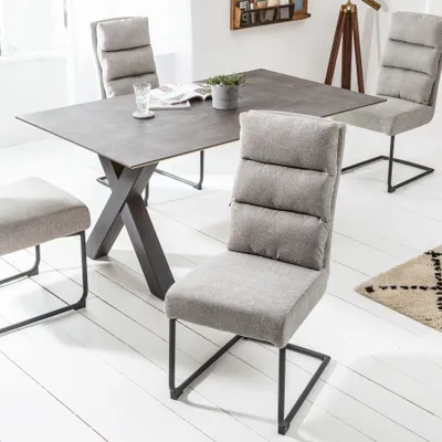 Produktbild von Moderner Freischwinger Stuhl COMFORT vintage hellgrau mit schwarzem Metall-Gestell und hochwertige Nosagfederung