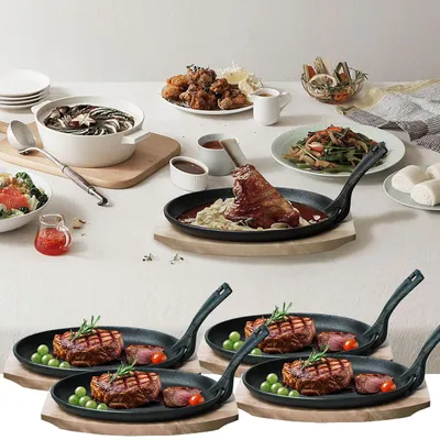 Produktbild von 4er-Set Massive Profi Servierpfanne aus Gusseisen mit Holz-Untersetzer, 24 x 14 x 2,2 cm, Abnehmbarer Griff bis 230 °C hitzebeständig