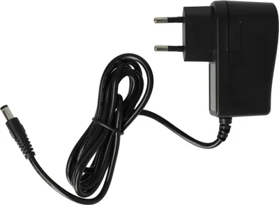 A black power adapter with a coiled cord and a DC barrel connector, set against a white background.