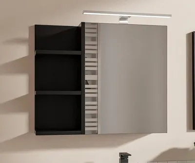 A modern black bathroom cabinet with a mirrored door and open shelves, mounted on a wall.