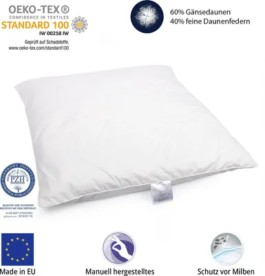 A white pillow is shown on a white background with various certification logos and text overlays.