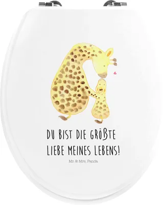 A toilet seat with a watercolor illustration of two giraffes and text.