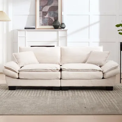 Image de Un canapé double moderne et simple, avec un matelas à ressorts, un seul coussin, confortable mais spacieux, idéal pour un salon, une chambre ou un bureau, de couleur beige