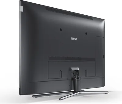 The back of a black television set on a stand, against a white background.