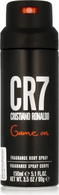 A black spray can with white and orange text and branding.