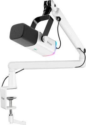 A white microphone with a boom arm and clamp attached to a surface.