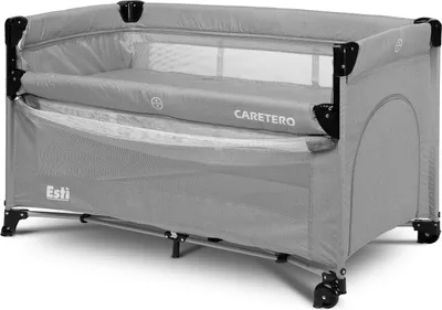 A gray travel crib with a mattress inside, shown from a side angle.