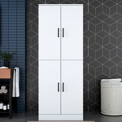 A tall, white cabinet with four doors stands in a modern bathroom setting.
