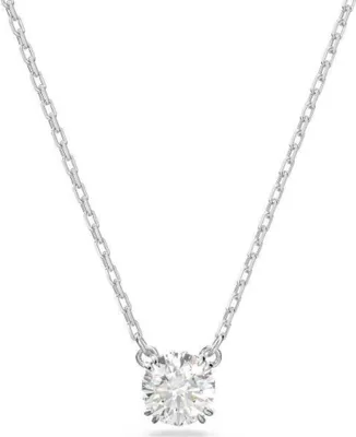 A close-up studio shot of a diamond pendant necklace on a white background.