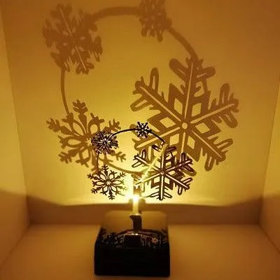 Produktbild von Sompex Akku Schattenwerfer LED Tischlampe „Shadow“ – Schneeflocken Schattenspiel, kabellos & dimmbar
