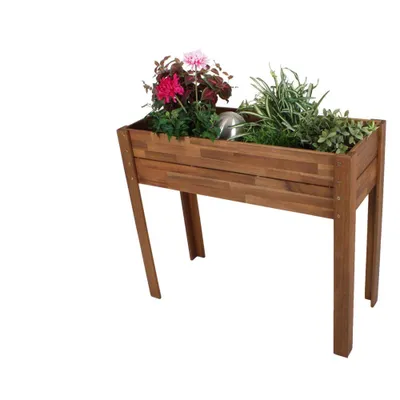 A wooden raised garden bed filled with plants and flowers, set against a white background.