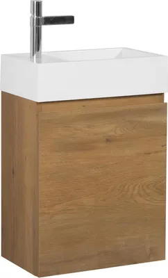 A modern bathroom vanity set with a white sink and a wooden cabinet.