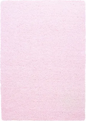 A close-up, top-down view of a pink shaggy rug.