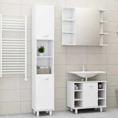 A clean, modern bathroom with white furniture.