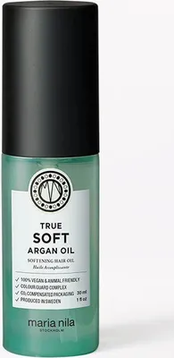 A bottle of Maria Nila True Soft Argan Oil on a white background.
