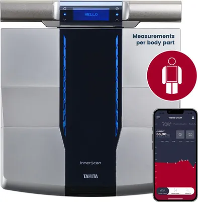 A Tanita RD-545HR intelligent body analysis scale with a smartphone displaying health data.