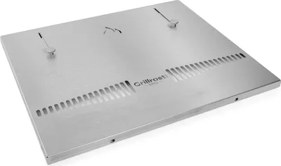 A silver metal back panel for a grill.